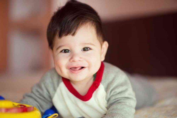 When do babies say their first word?