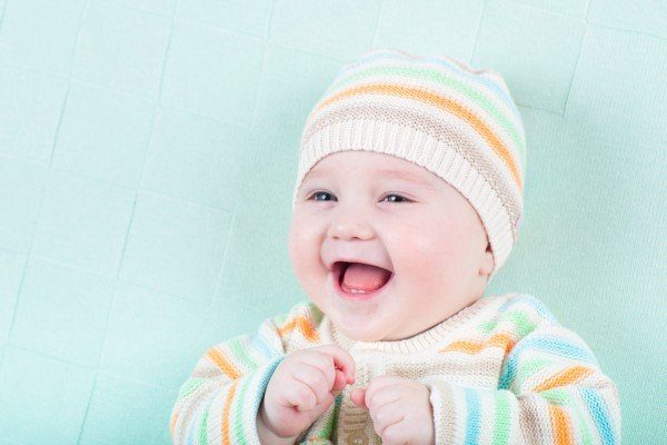 How do I dress my baby for cold or warm weather?