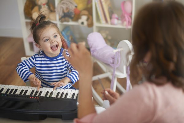 How does music boost language development?