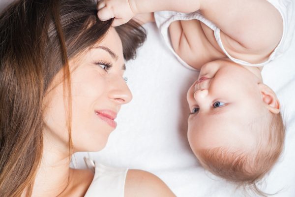 When do babies discover their hands?