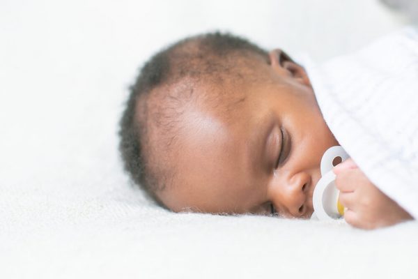 When Can a Baby Sleep With a Blanket Or Pillow?