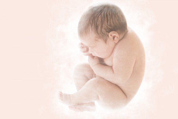 What is intrauterine growth and how does it happen?