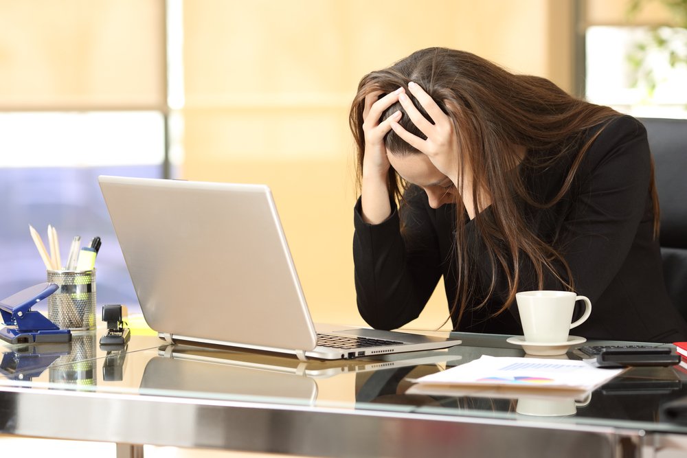 woman feeling frustrated at work