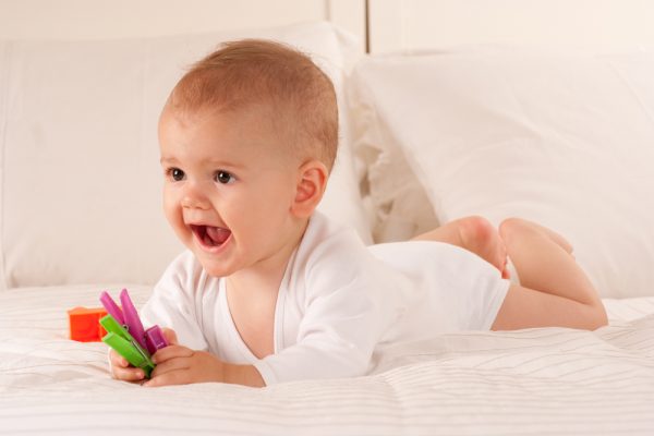 When do babies smile?