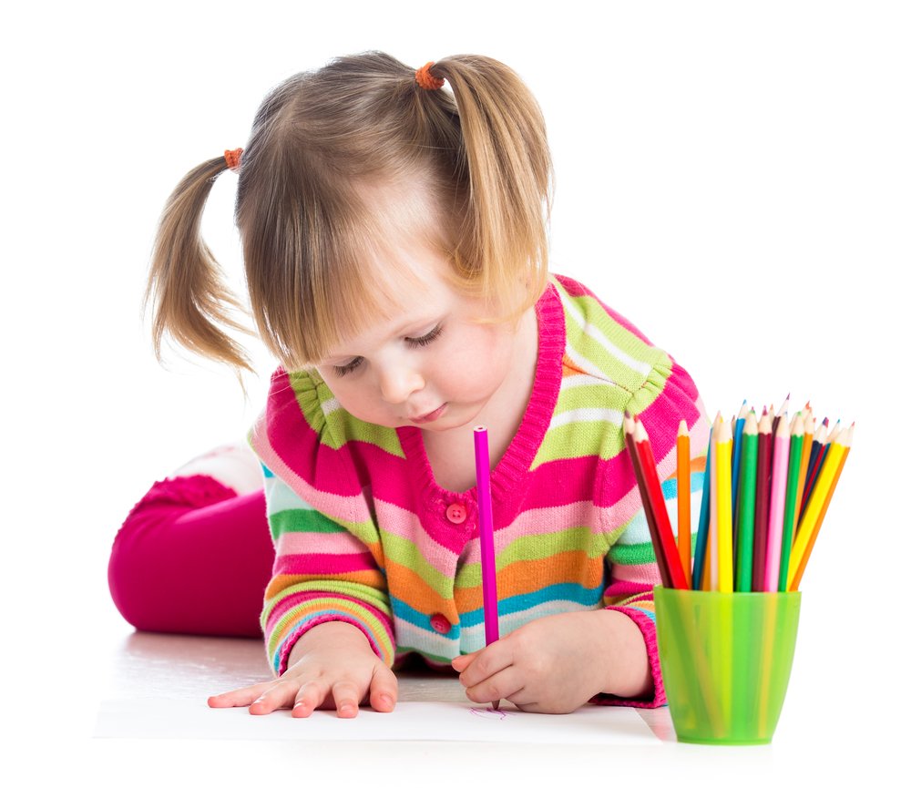 left-handed little girl scribbling