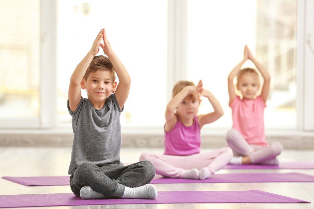 toddlers doing yoga