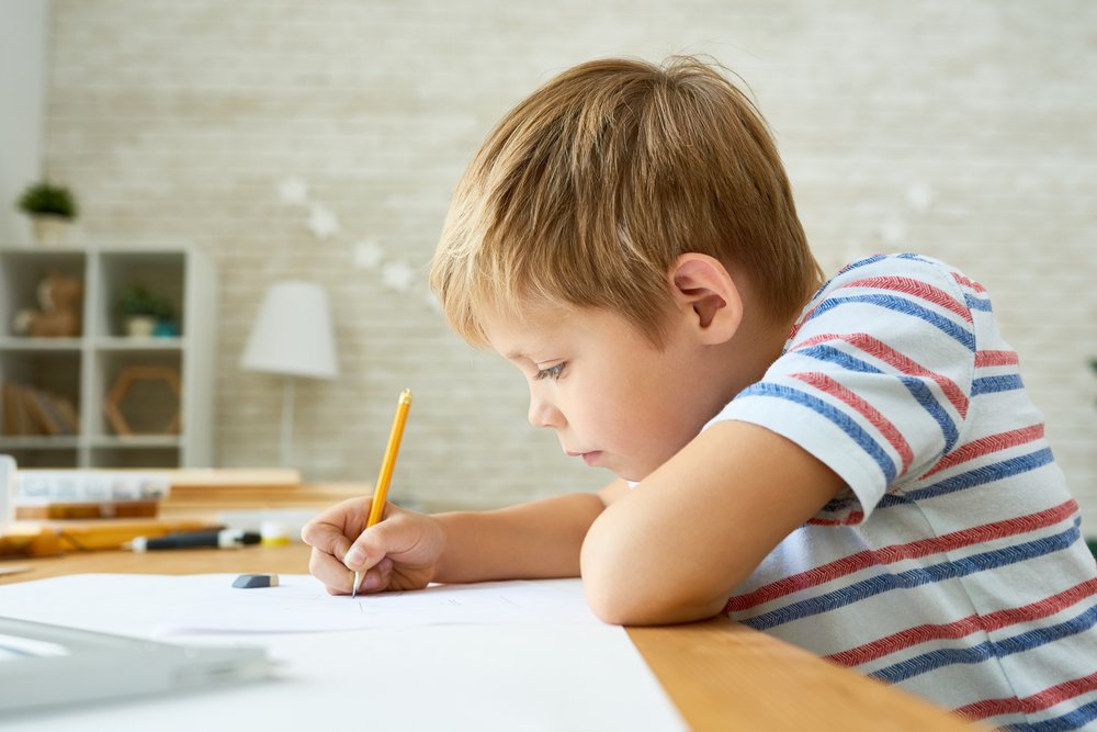 little boy drawing