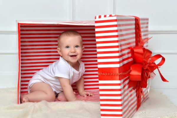 baby inside a present box