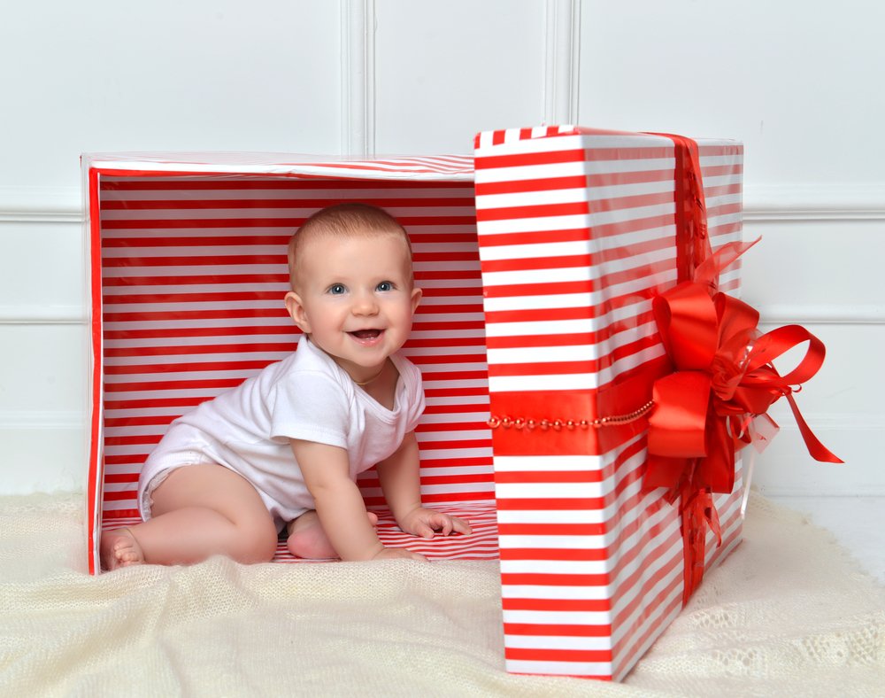 baby inside a present box