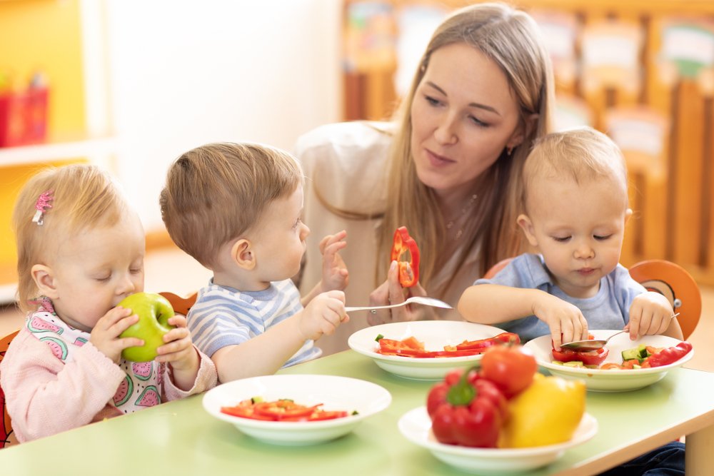 Woman introducing solids to babies