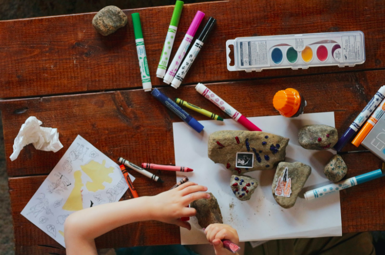 child using art materials during their speech therapy activities